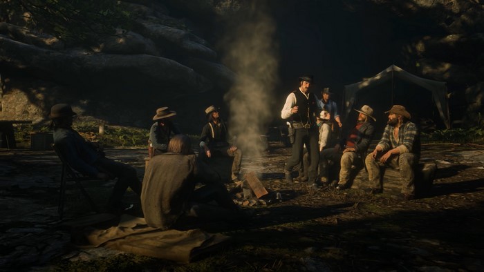 Red Dead Redemption 2 group around campfire