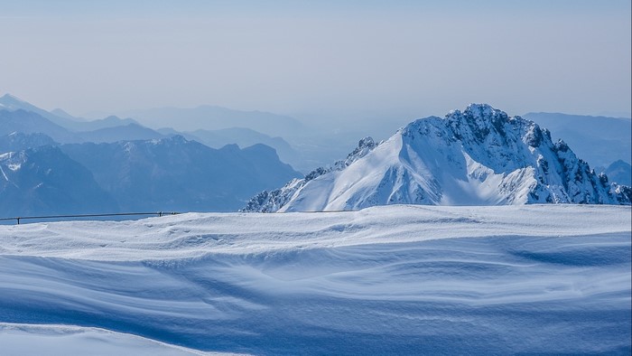 Snowy mountains under a clear blue sky