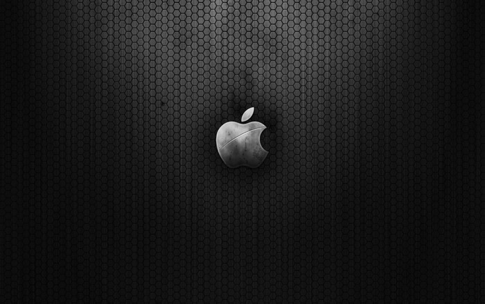 Apple logo on a dark hexagonal pattern
