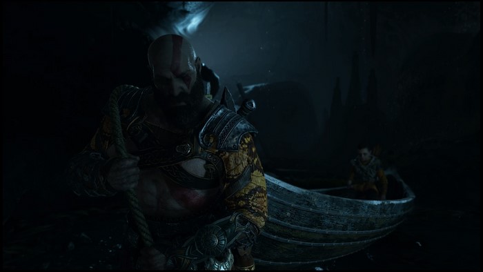 Kratos and Atreus in a boat from God of War