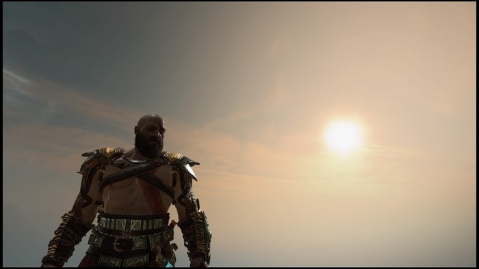 Kratos from God of War (2018) against the sun