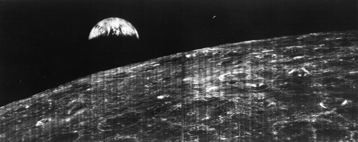 Earth rising over the Moon's surface