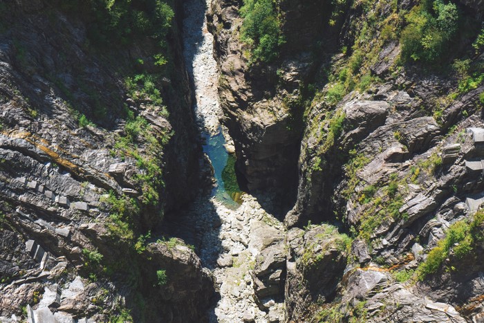 Aerial view of a rocky gorge with a river