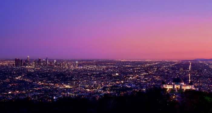 Los Angeles cityscape at dusk with Griffith Observatory