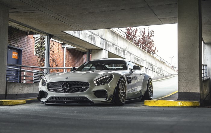 White Mercedes-AMG GT PD900GT in parking garage