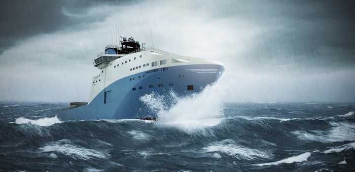 4K ship named MERSK TBN sailing in rough seas during a storm