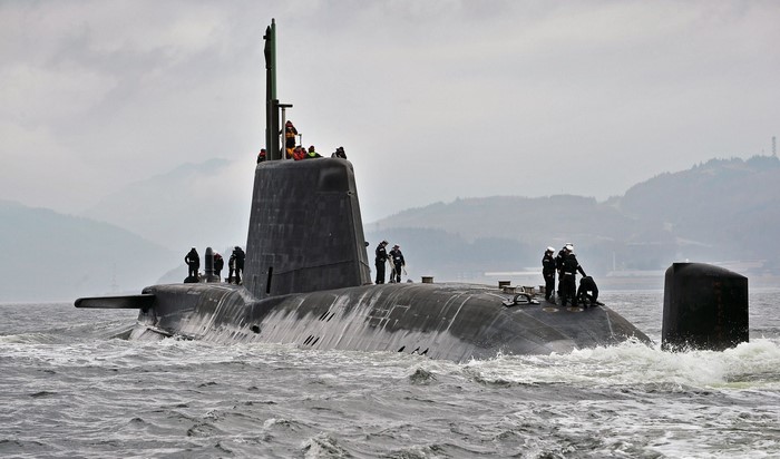 Astute-class submarine on the water with crew
