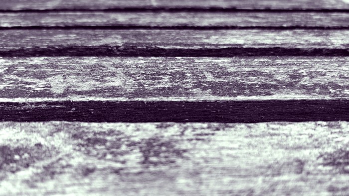 Close-up of a weathered wooden surface texture