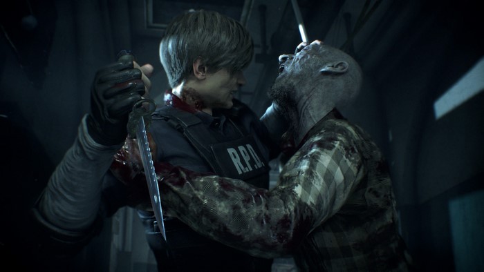 Leon S. Kennedy from Resident Evil 2 fighting a zombie