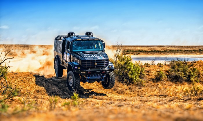 Red Bull Kamaz truck racing in a desert