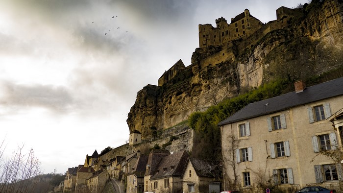 Castle on a cliff above a village