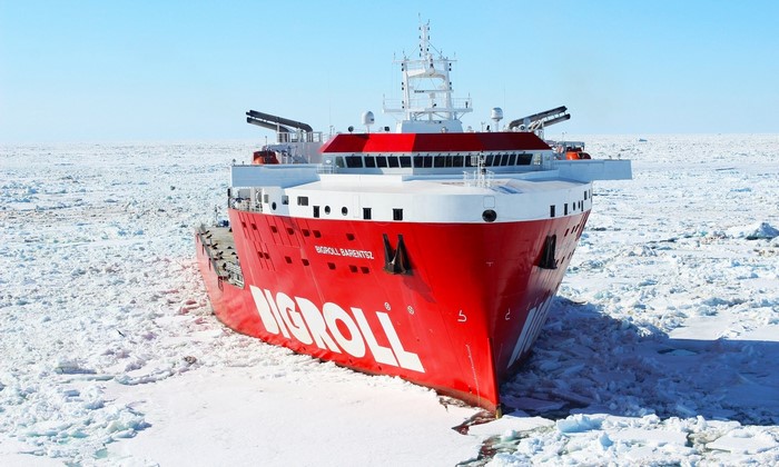 Red icebreaker ship "BIGROLL BARENTSZ" in Arctic ice