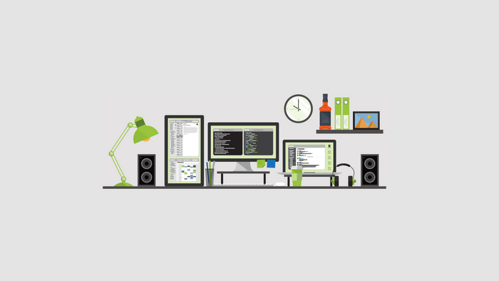 Minimalist programming setup with multiple displays and desk accessories