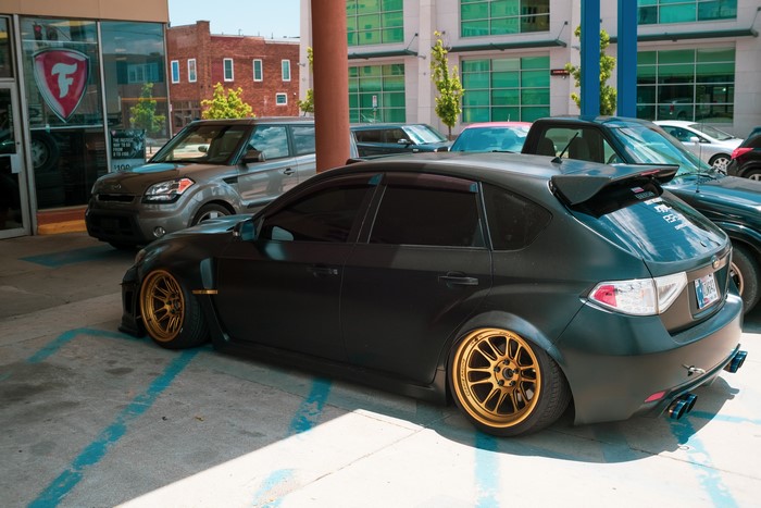4K Subaru Impreza with gold wheels