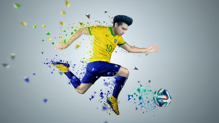 Soccer player in Brazil uniform with exploding particles