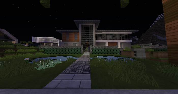 Modern Minecraft mansion with ponds and gardens