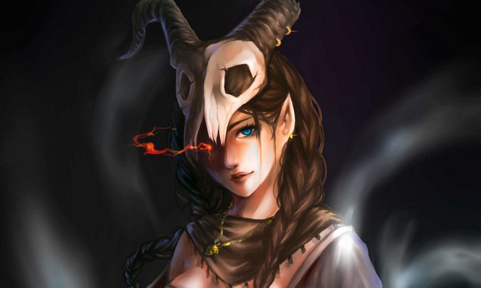 Fantasy girl with skull mask and blue eyes