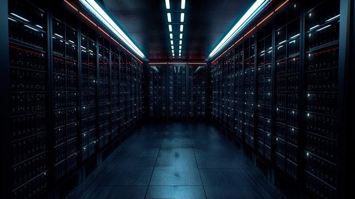 Dark server room with blue and red lights