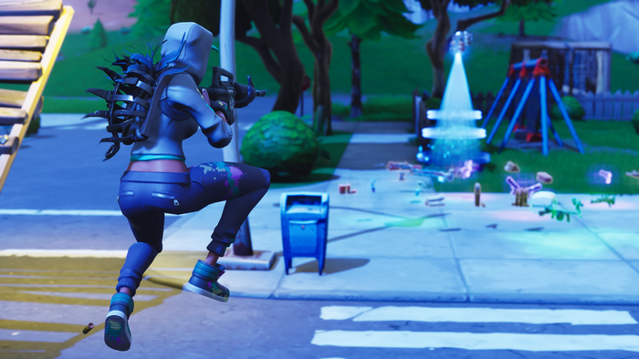 Fortnite character with weapon in a playground