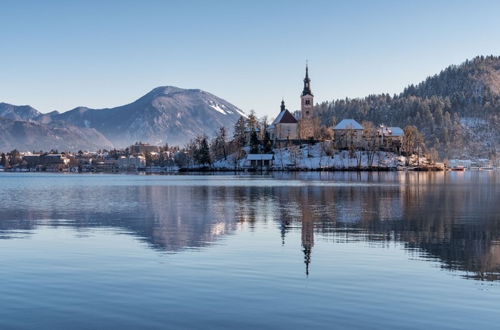 Winter landscape of Lake Bled with a church on an island
