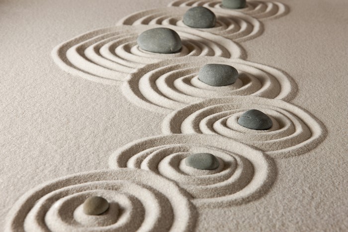 Zen garden with raked sand and stones