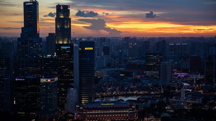 Singapore cityscape at sunset with Fullerton Hotel