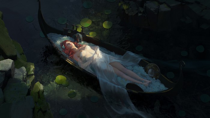 Redhead woman in a boat on a lake