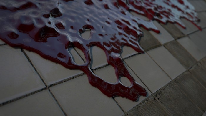 Blood spilled on tiled floor