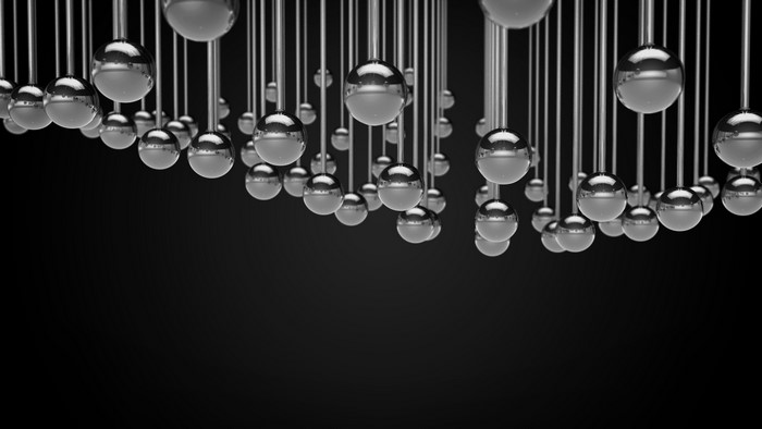 Monochrome render of burnished spheres with reflections