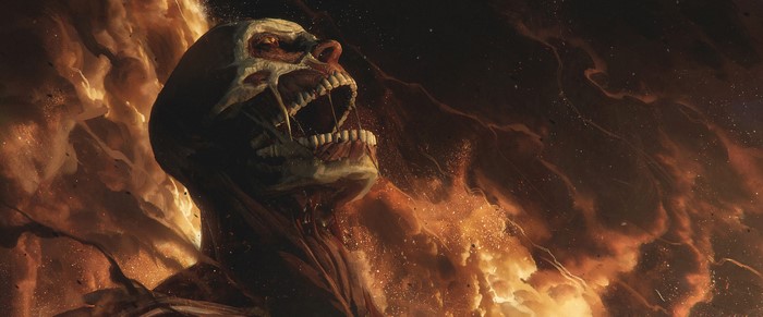 Colossal Titan in fire and smoke from Attack on Titan