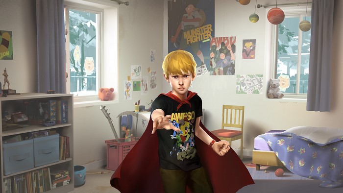 Boy dressed as a superhero in his room