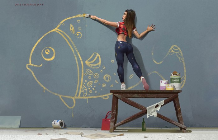 Woman painting a fish mural on a wall