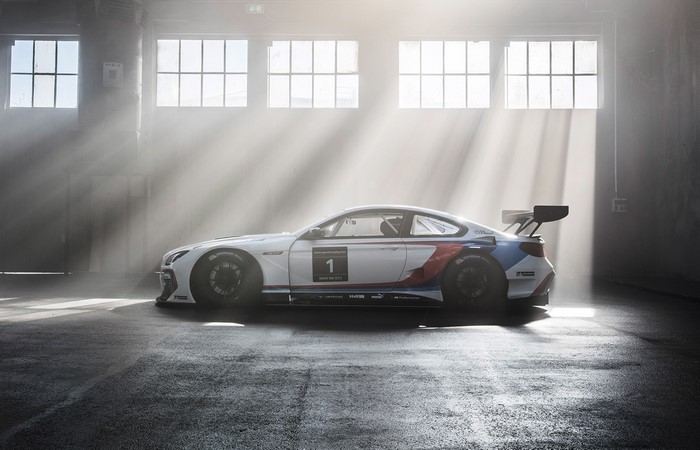 BMW M6 GT3 race car in a warehouse