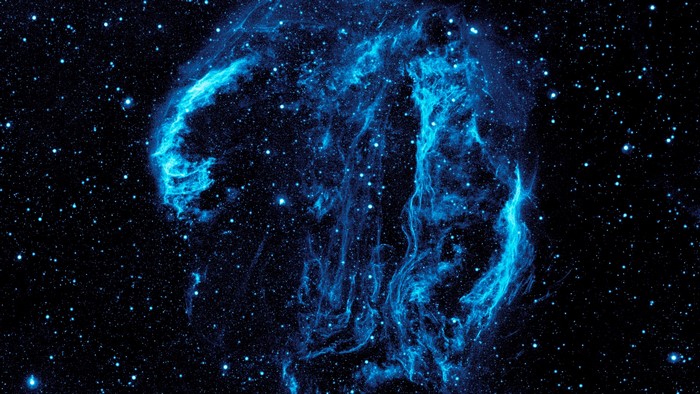 Cyan nebula and stars in space