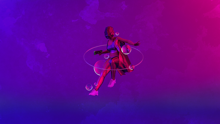 Woman in futuristic outfit with weapon and bubbles
