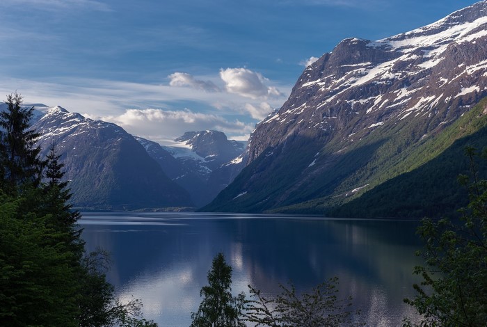 Snow-capped mountains and a lake in Norway