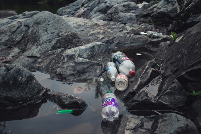 Plastic bottles and trash in nature