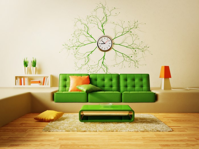 Green living room interior with clock and sofa