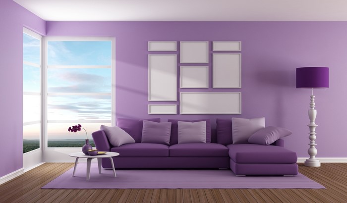 Purple living room with sectional sofa and floor lamp