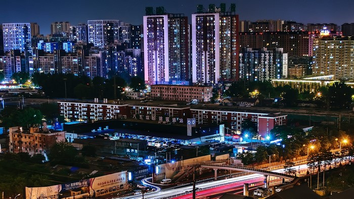 Cityscape of Beijing at night with light trails