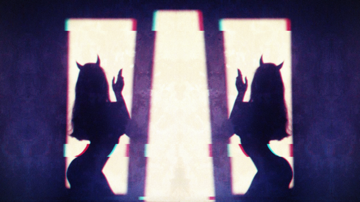 Silhouette of a woman with demon horns and glitch effect
