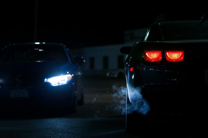 4K Chevrolet Camaro and BMW at Night