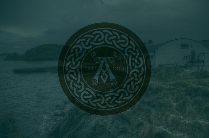 Ardbeg Distillery logo over coastal landscape