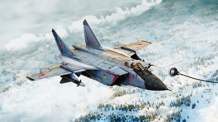 MiG-31 aircraft refueling in flight over snowy mountains