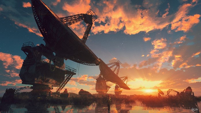 Abandoned radio telescopes at sunset with reflections