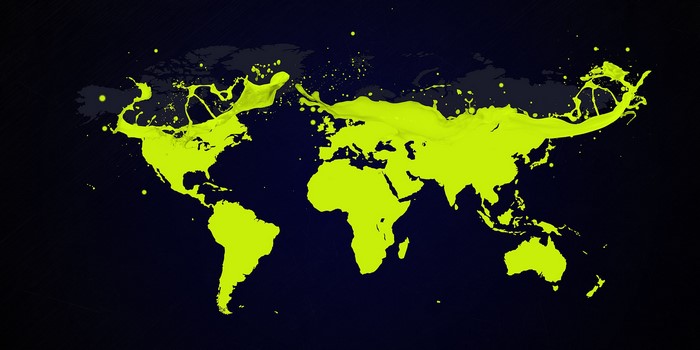 World map made of neon yellow paint splashes