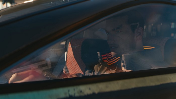Man driving a car in Cyberpunk 2077