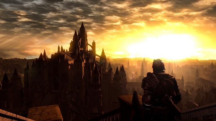 Dark Souls: Remastered knight overlooking a city at sunset