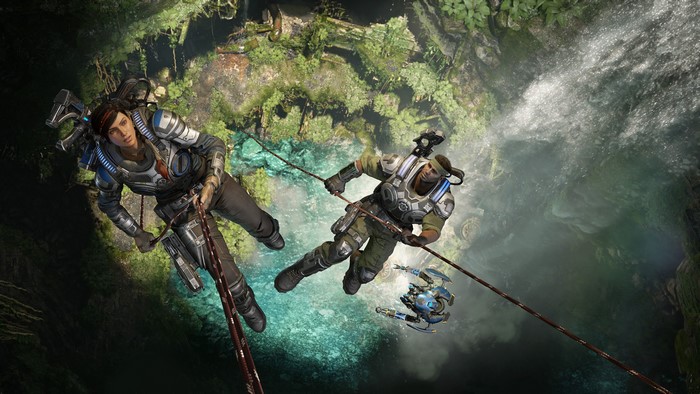 Kait and JD from Gears 5 rappelling down a chasm