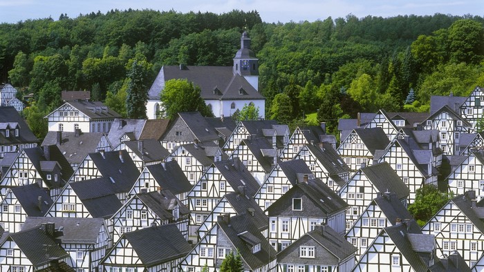 Half-timbered houses and church in a German town
